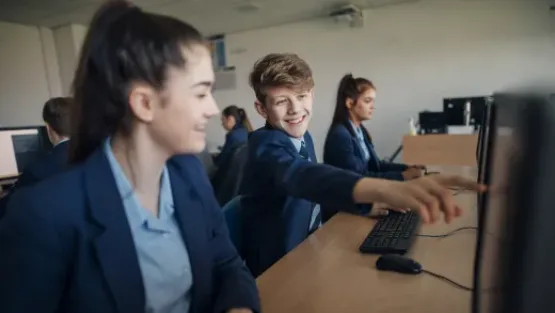 Students Pupils in class at computer
